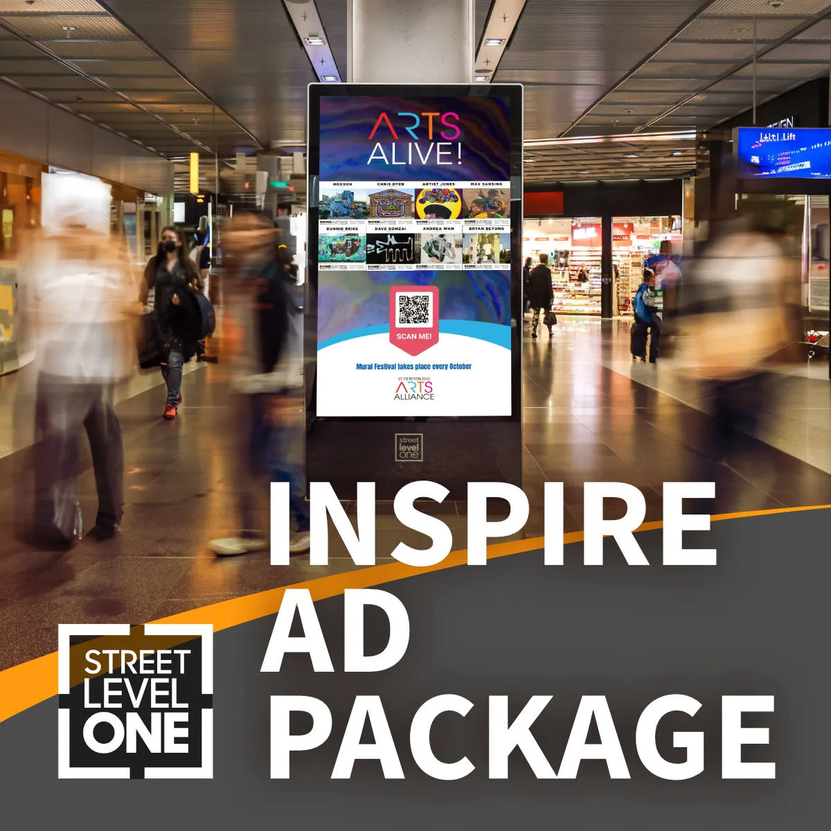 A vertical digital advertising kiosk stands in a busy indoor transit or shopping corridor, with blurred people walking around it. Large overlaid text at the bottom reads 'INSPIRE AD PACKAGE,' and the kiosk display includes 'ARTS ALIVE!' and other promotional content.
